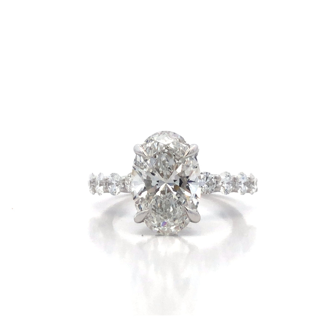 14Ct White Gold Lab Grown Oval Shaped 4.00Ct Diamond Engagement Ring With Hidden Halo And Lab Grown Diamond Set Band Size M.5 Centre 4.00Ct, Tdw=5.00Ct EF VS/SI Has IGI cert.