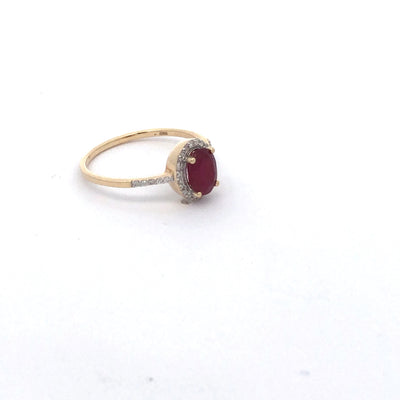 14Ct Yellow Gold Oval Shaped Natural Ruby And Diamond Halo Ring.
