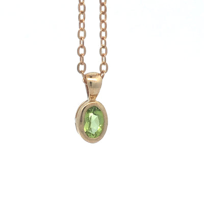 9Ct Yellow Gold Bezel Set Oval Peridot Pendant